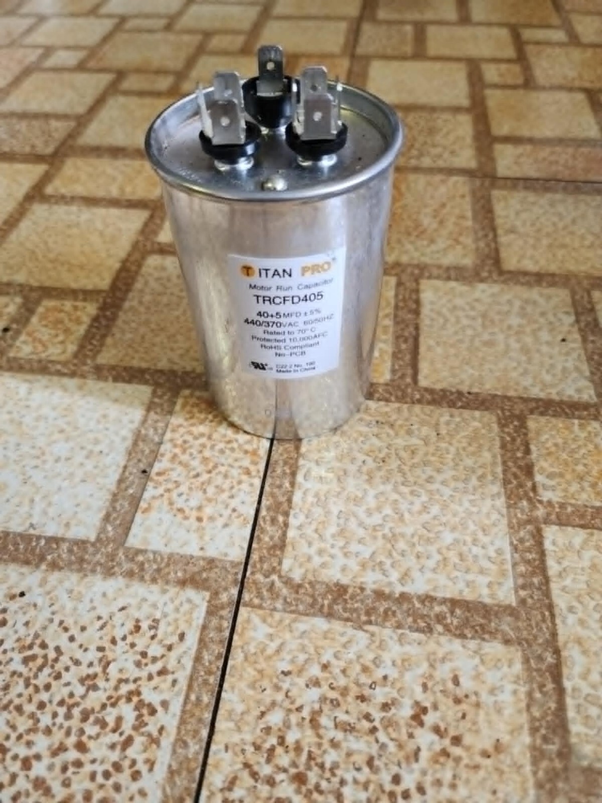 Packard Titan Pro Run Capacitor, Round, 40+5 Mfd, 440-370V, TRCFD405 – Used