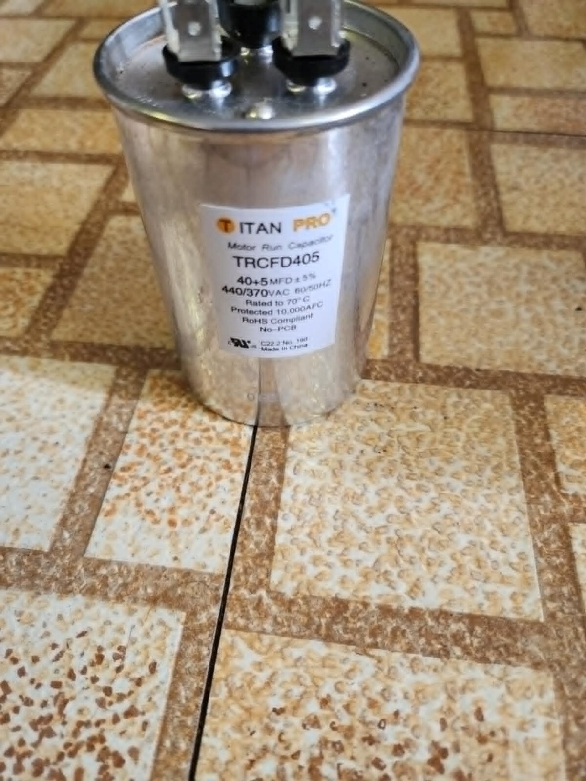Packard Titan Pro Run Capacitor, Round, 40+5 Mfd, 440-370V, TRCFD405 – Used