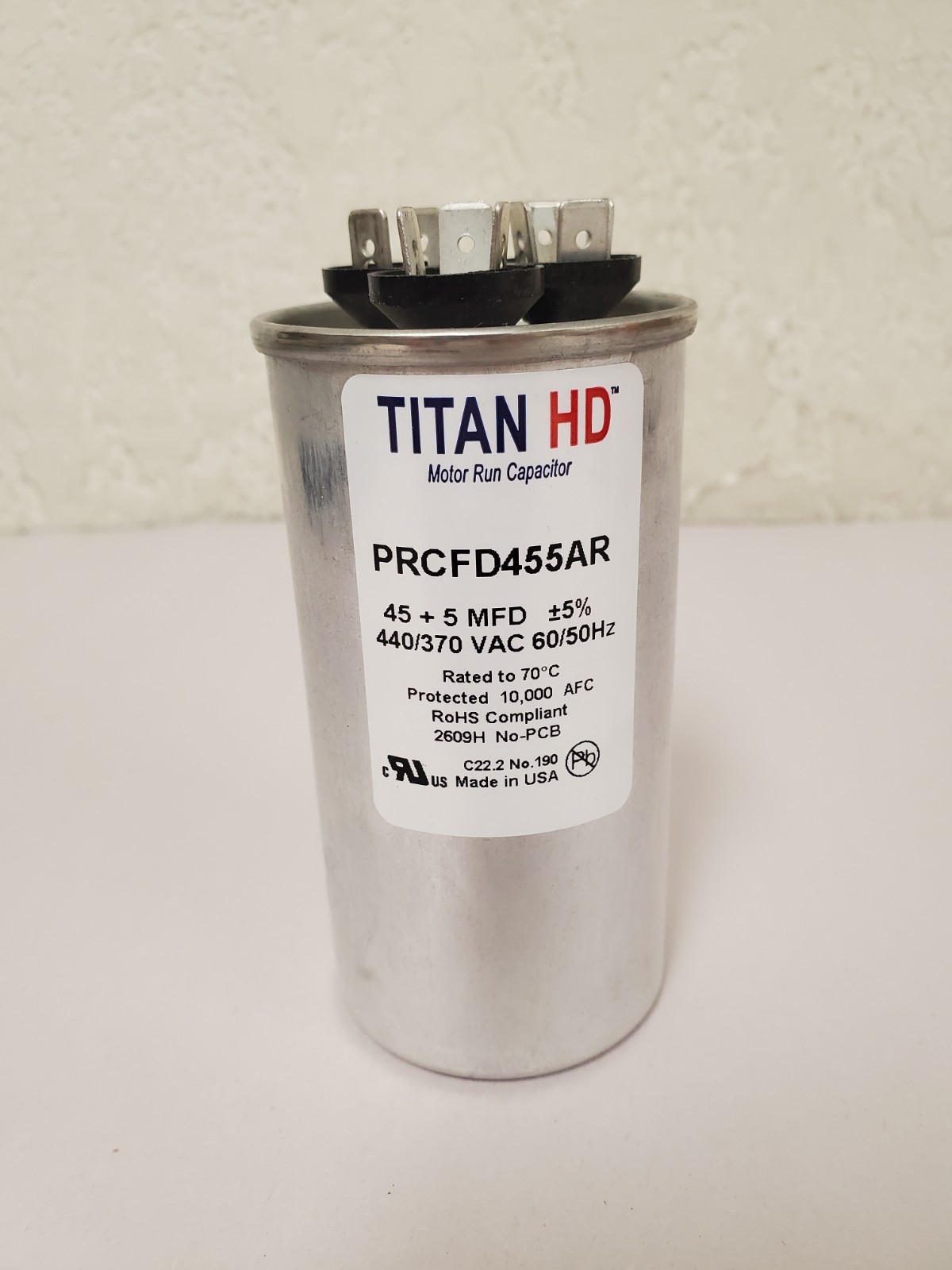 TITAN HD 45 Plus 5 MFD, 440V/370V Dual Voltage Round Run Capacitor (PRCFD455AR)