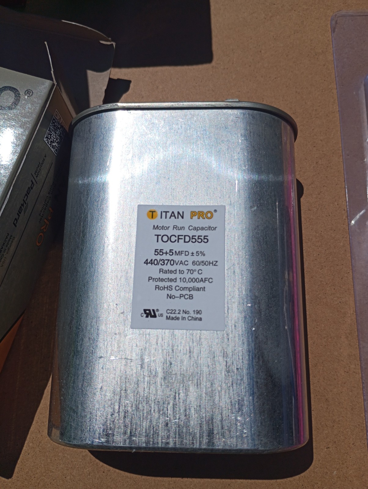 Packard Titan Pro TRCFD555 Motor Run Capacitor 55+5 MFD MFD/uF 440/370V Round NI
