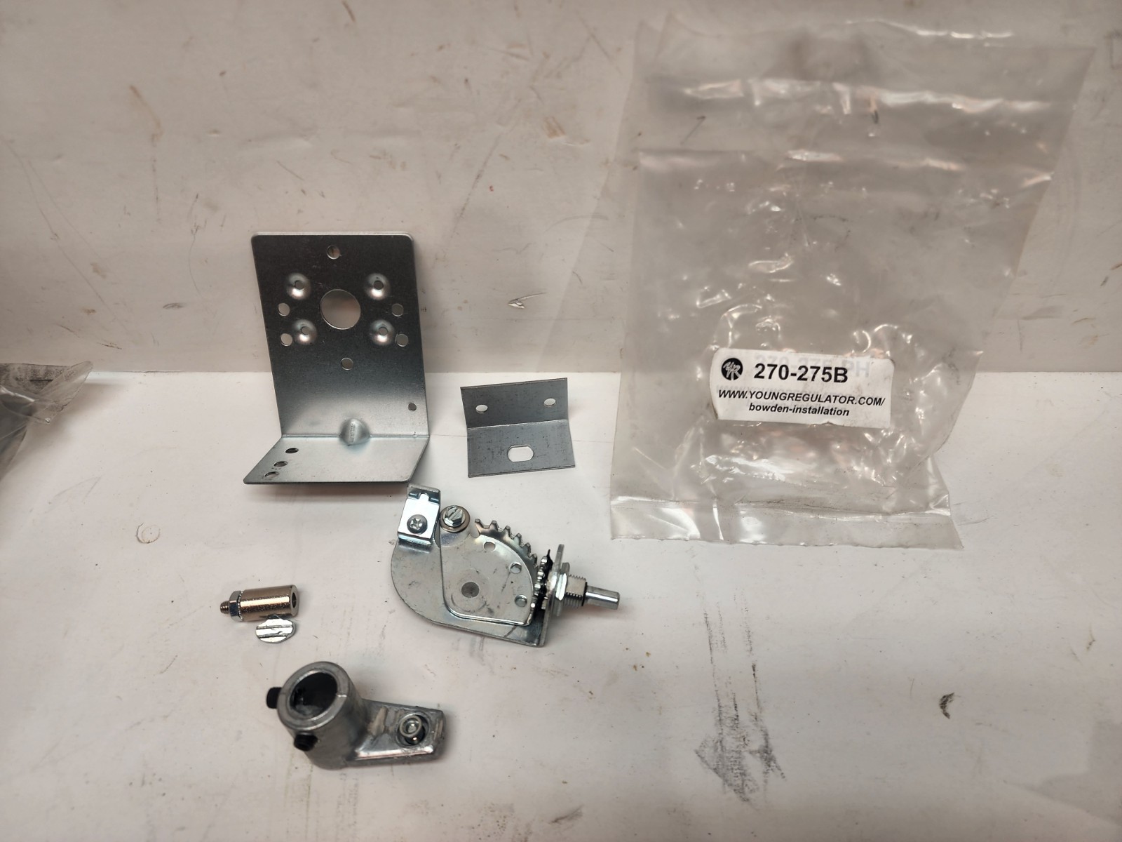 Lot 2 Young Regulator 270-275B Rack and Pinion Control with an Angle Bracket