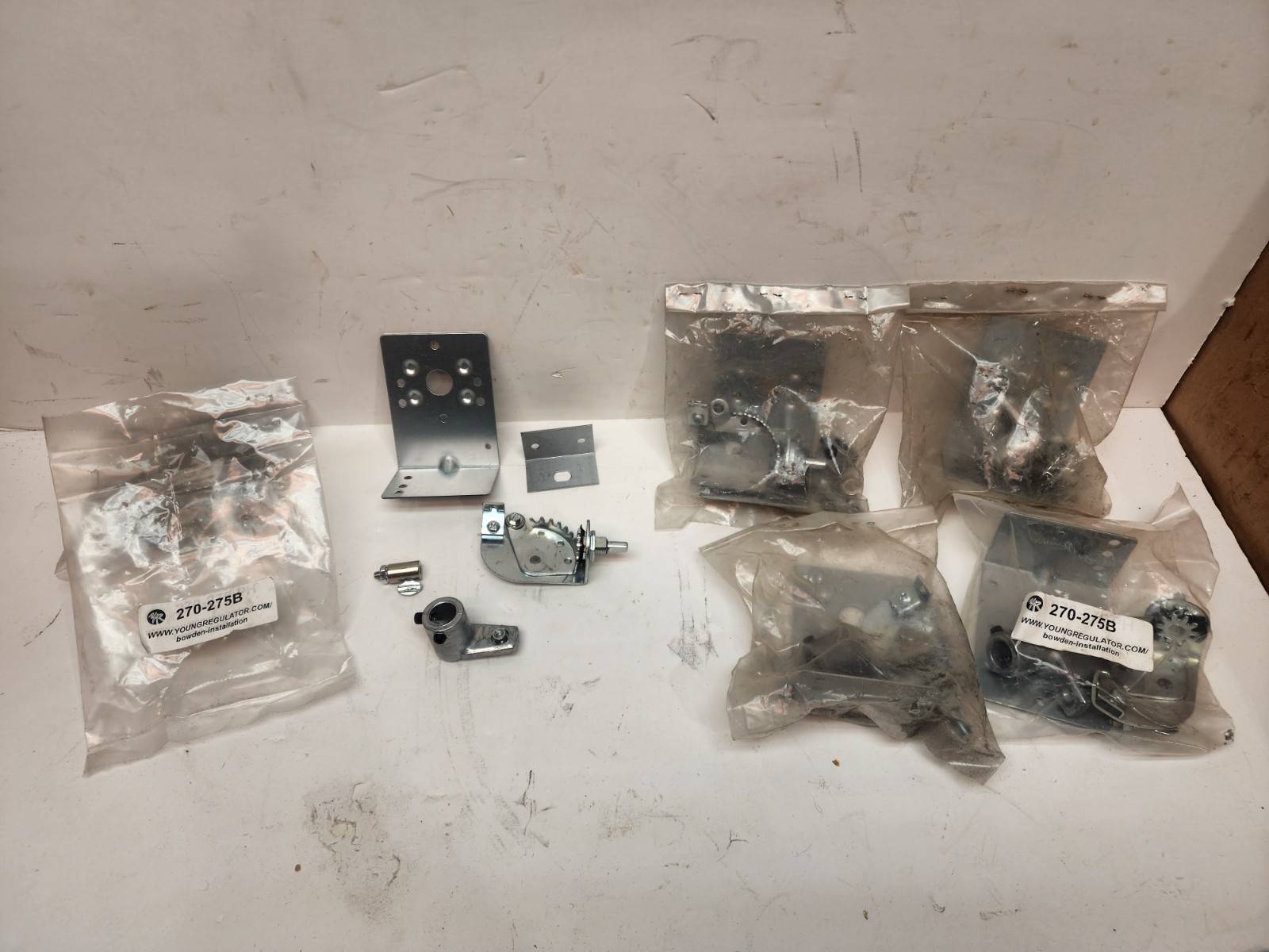 Lot 2 Young Regulator 270-275B Rack and Pinion Control with an Angle Bracket