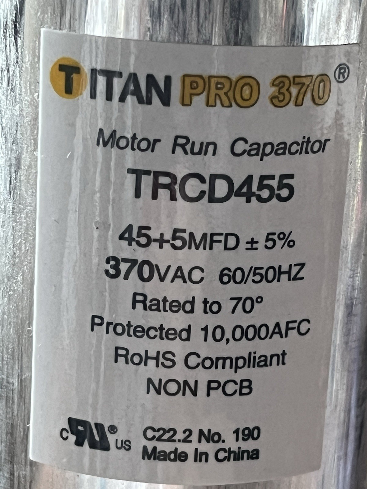 Titan Pro TRCD455 HVAC Round Dual Run Capacitor. 45+5 370 VAC A/C PACKARD
