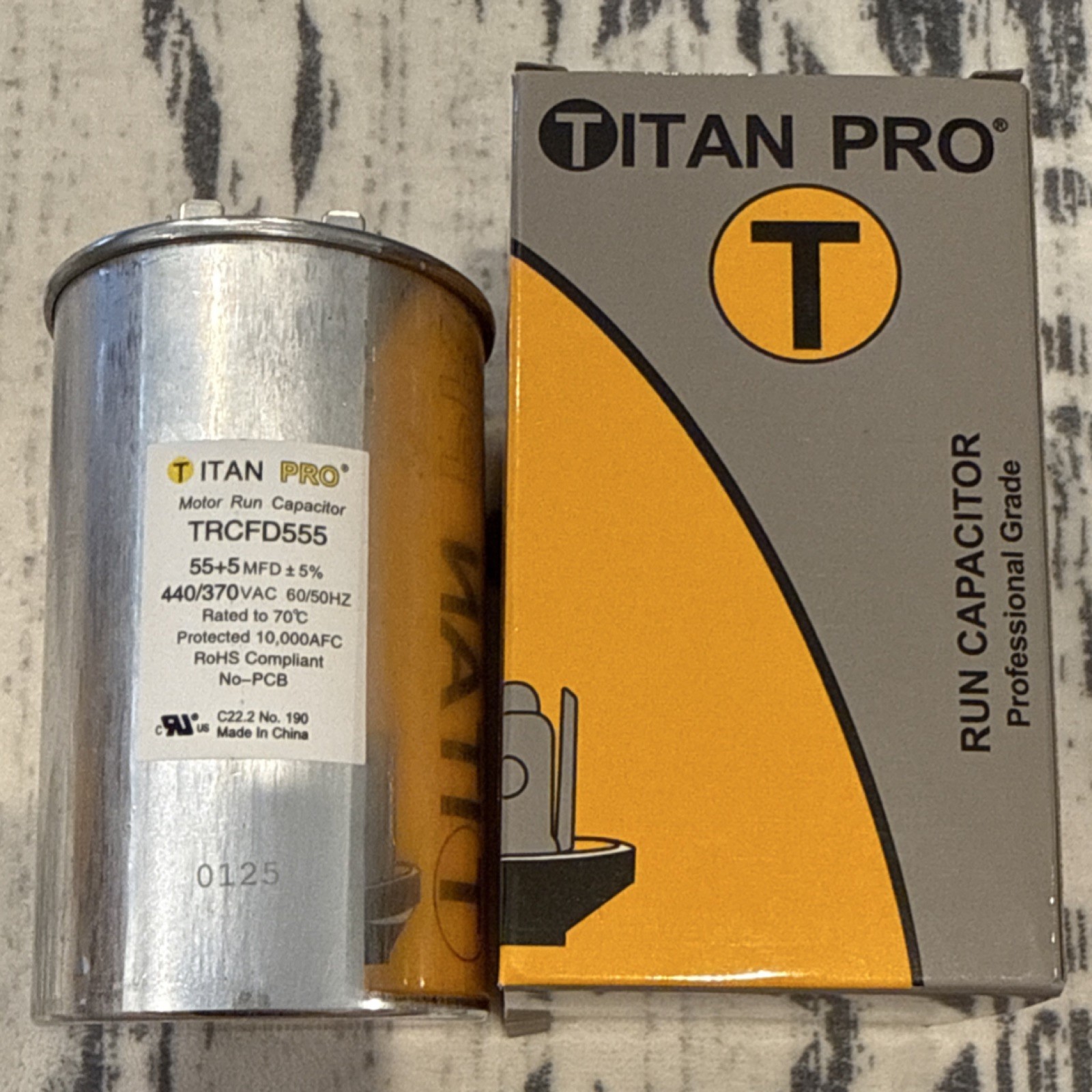 Titan Pro Motor Run Capacitor 55+5 µF Round 440/370 VAC TRCFD555